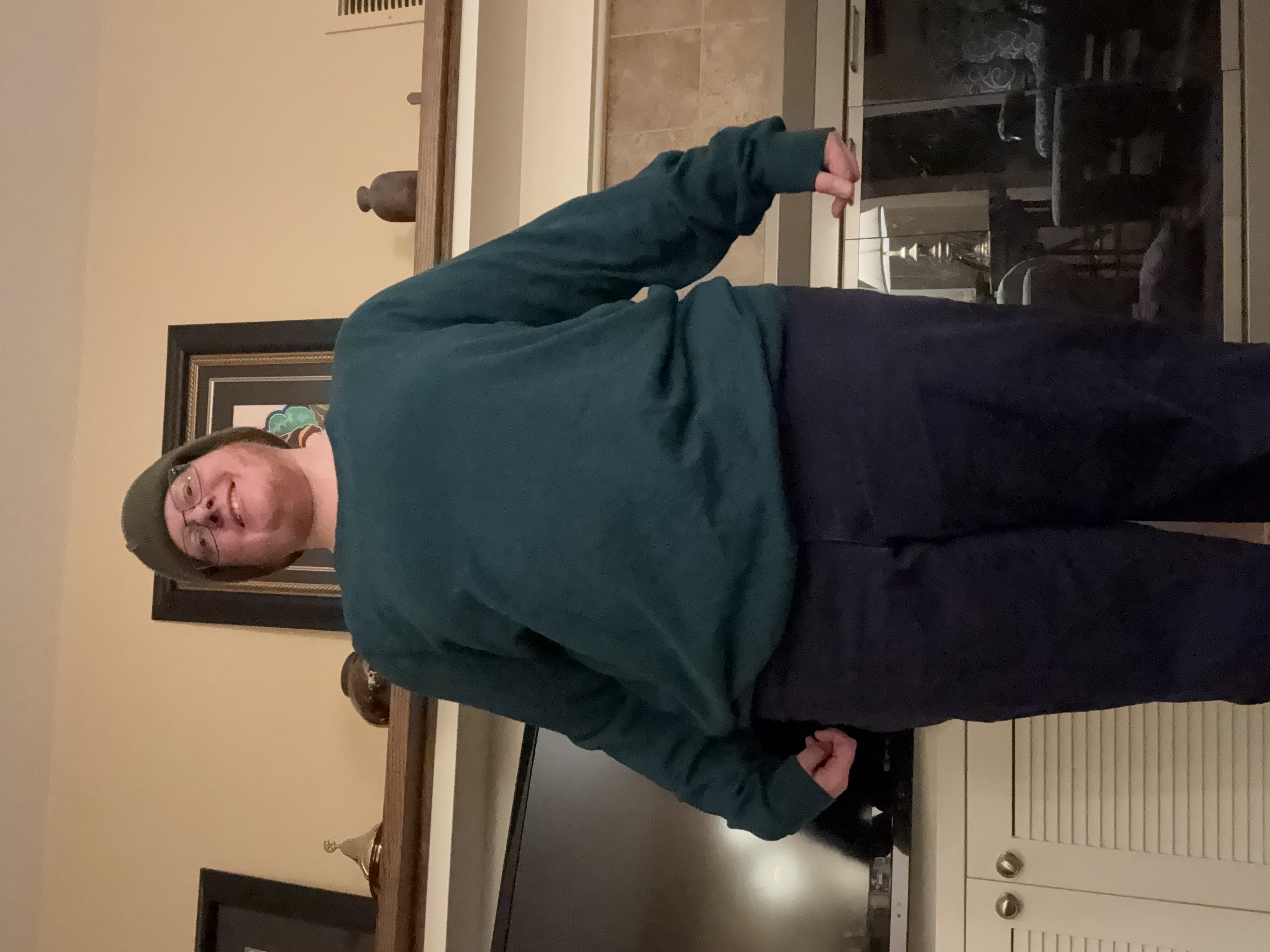 Just me in some clothes, long sleeve bluish green sweater, tshirt underneath, long pants, tennis shoes, winter hat. I also have glasses and a beard. Body is... vague, but fat.